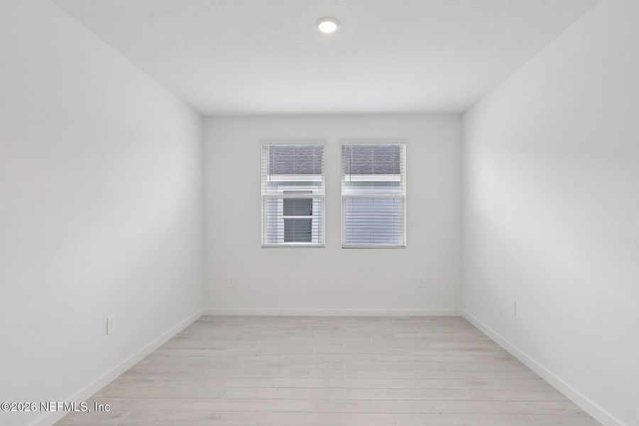 Spacious, unfurnished interior of a new home in Colbert Landings, Palm Coast (Image 22).