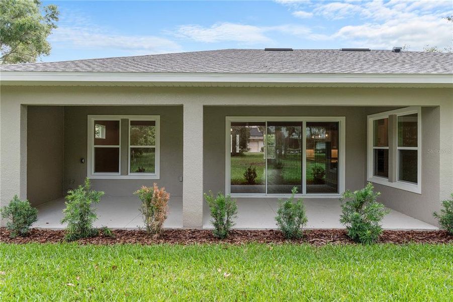 Exterior details and patio area of a home in , Lecanto (Image 24).