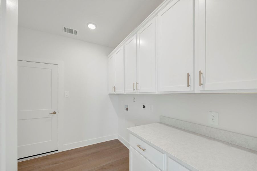 Furnished interior view inside a new home in The Oaks on 6th Street, Magnolia (Image 11).