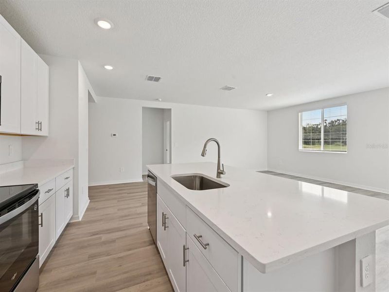 Furnished interior view inside a new home in The Reserve at Van Oaks, Auburndale (Image 3).