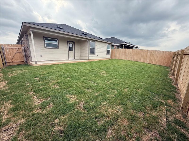 Front exterior of a new home in Waterstone: Claremont Collection, Kyle, TX, highlighting curb appeal (Image 1). Front exterior of a new home in Waterstone: Claremont Collection, Kyle, TX, highlighting curb appeal (Image 1).