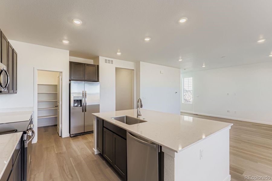 Furnished interior view inside a new home in Parterre, Thornton (Image 4).