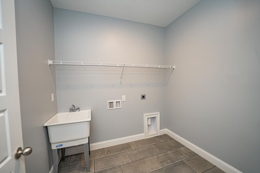 Representative unfurnished interior of a home built from the Roosevelt Elite by Enchanted Homes in Pointe Summit, Slater-Marietta (Image 33).