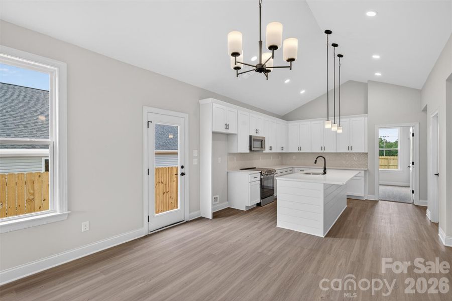 Furnished interior view inside a new home in , Monroe (Image 9).