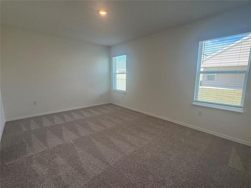 Spacious, unfurnished interior of a new home in Villamar, Winter Haven (Image 11).