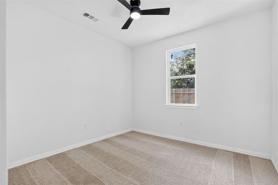 Bedroom with carpet floors and ceiling fan