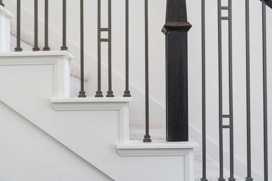 Wrought iron railing gives an elevated look Wrought iron railing gives an elevated look