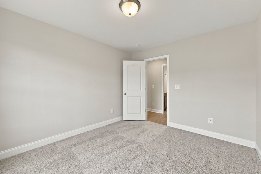 Spacious, unfurnished interior of a new home in Davenport Farms, Winterville (Image 34).