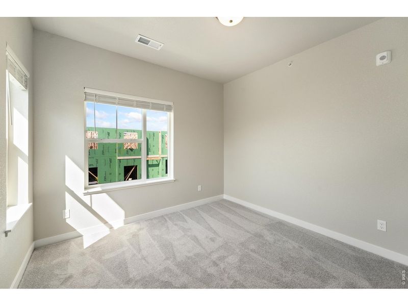 Spacious, unfurnished interior of a new home in The Lakes at Centerra, Loveland (Image 41).