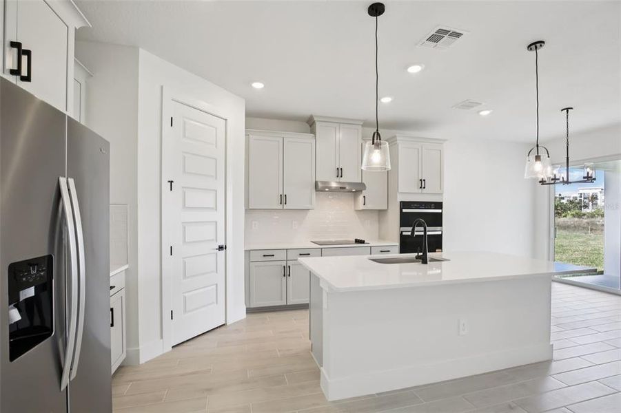 Furnished interior view inside a new home in Magnolia Bay - Reserve Series, Nokomis (Image 4).