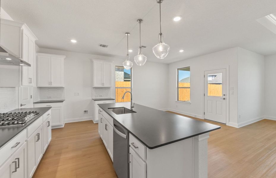 Furnished interior view inside a new home in Saddleback at Santa Rita Ranch, Liberty Hill (Image 6). Furnished interior view inside a new home in Saddleback at Santa Rita Ranch, Liberty Hill (Image 6).