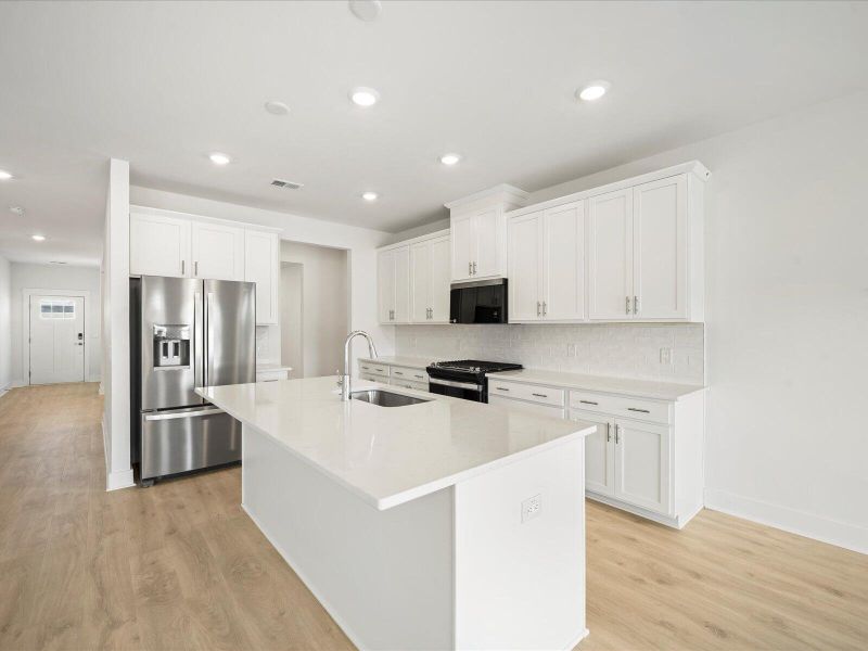Furnished interior view inside a new home in The Coves at Lakes of Cane Bay, Summerville (Image 9).
