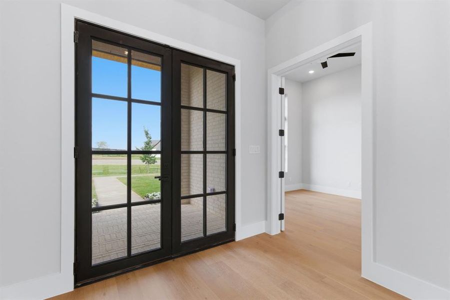 Welcome Family & Guests thru the Iron & Glass Custom Door!