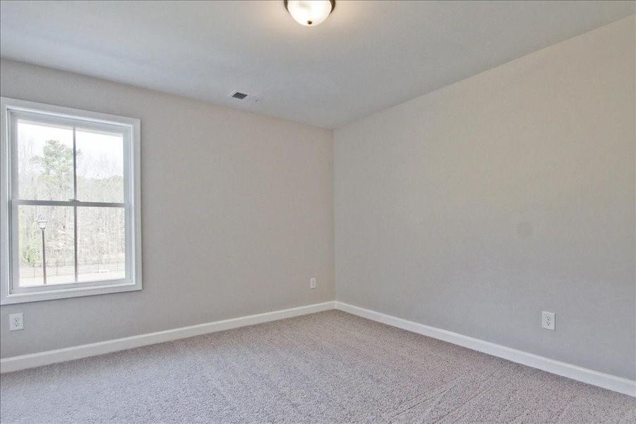 Spacious, unfurnished interior of a new home in River Walk Place, Lawrenceville (Image 23).