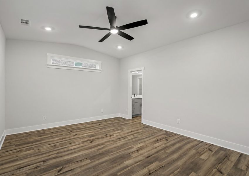 The master bedroom is beautiful and relaxing.