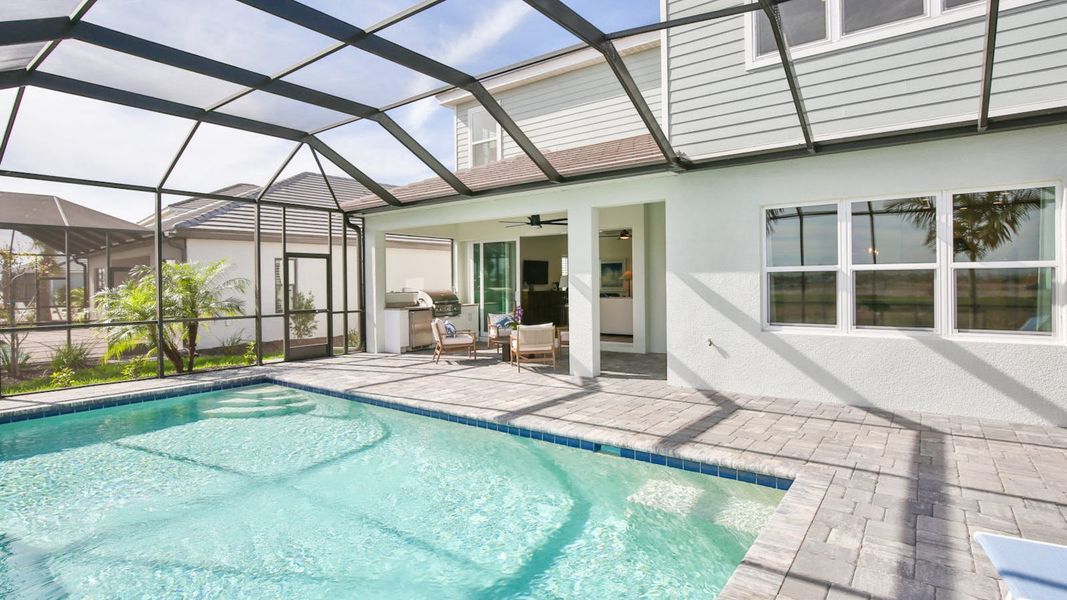 Exterior details and patio area of a home in Palm Grove, Lakewood Ranch (Image 29).