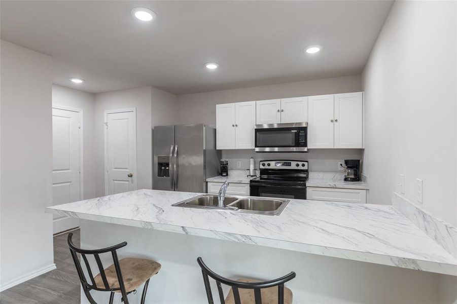 Furnished interior view inside a new home in Waterside at Cedar Creek, Abilene (Image 17).