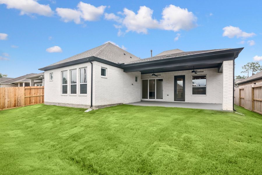 Exterior details and patio area of a home in The Highlands 55' - Encore Collection, Porter (Image 4). Exterior details and patio area of a home in The Highlands 55' - Encore Collection, Porter (Image 4).