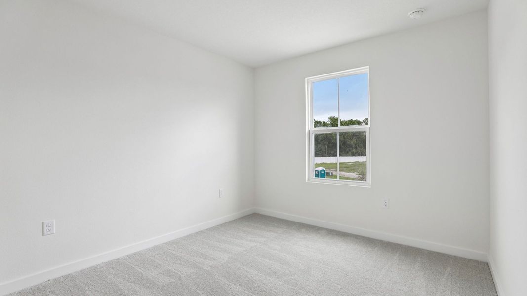 Furnished interior view inside a new home in Cyrene at Harmony, St. Cloud (Image 35).