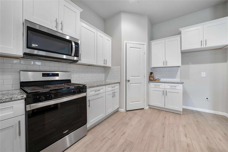 Furnished interior view inside a new home in Heritage Village, Haltom City (Image 6).