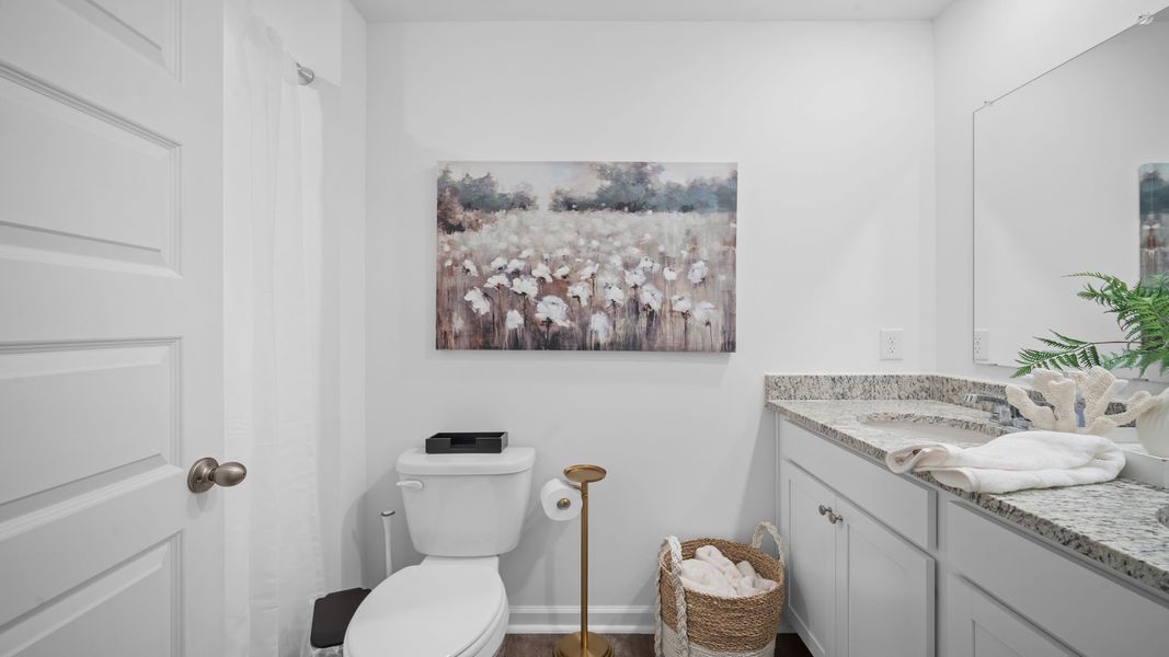 Representative furnished interior of a home built from the Freeport by D.R. Horton in Palm Ridge, Guyton (Image 14).