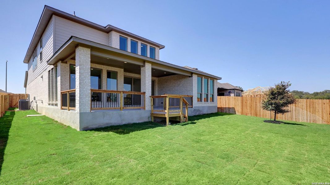 Exterior details and patio area of a home in Alsatian Oaks, Castroville (Image 4).
