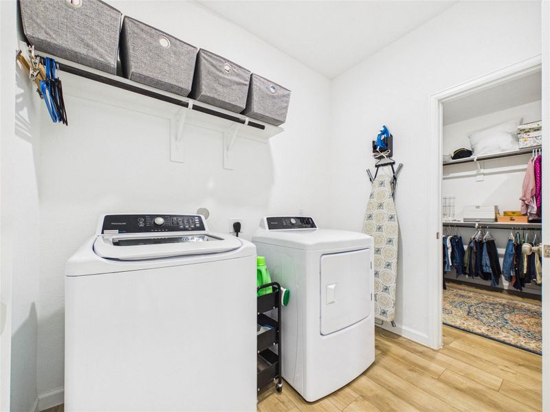 How convenient is this to have your closet connected to your laundry room? This room also has plenty of storage and hanging space.
