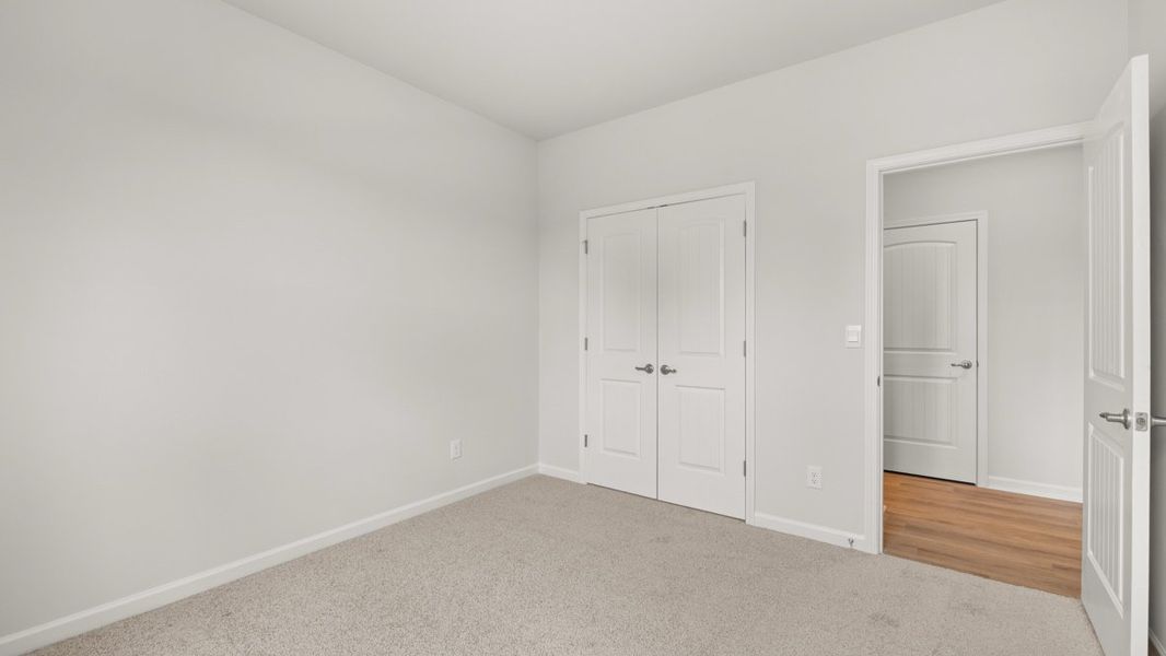 Spacious, unfurnished interior of a new home in Fairway 17 at Mirror Lake, Villa Rica (Image 26).