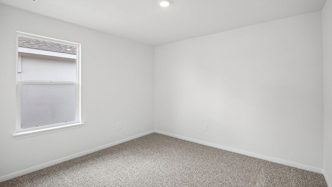 Spacious, unfurnished interior of a new home in Bar W Ranch, Leander (Image 29).
