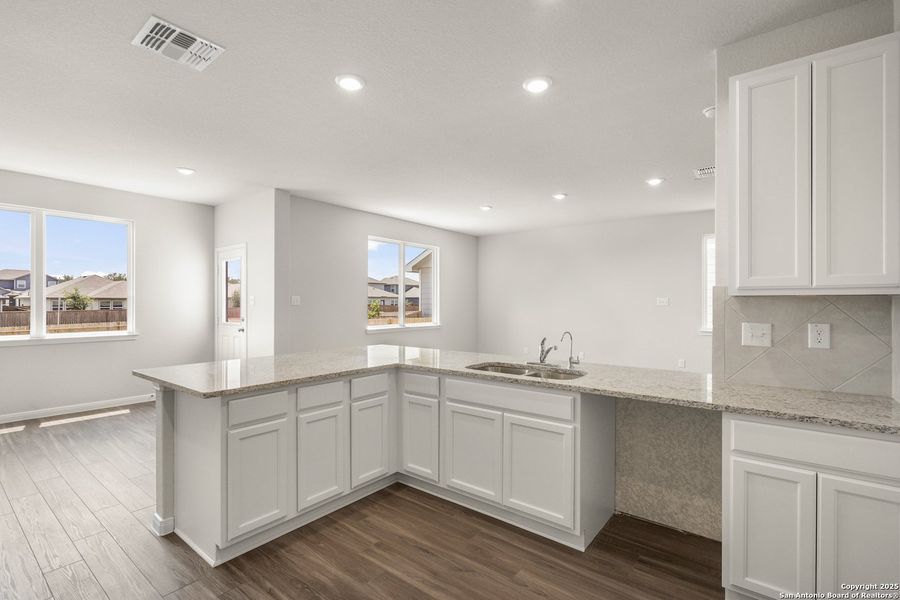 Furnished interior view inside a new home in Abbott Place, St. Hedwig (Image 7).