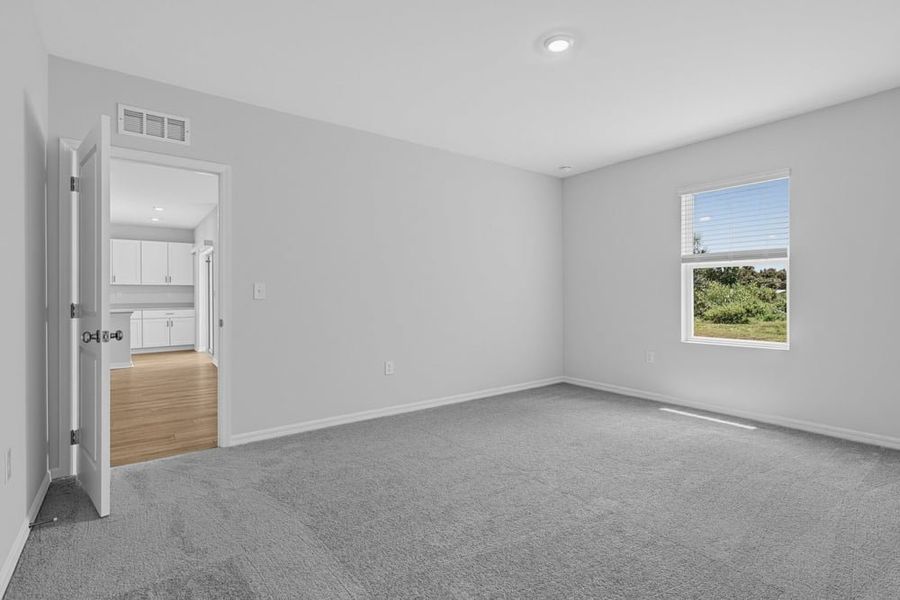 Representative unfurnished interior of a home built from the Goldfinch by Taylor Morrison in Solena, North Fort Myers (Image 13). Representative unfurnished interior of a home built from the Goldfinch by Taylor Morrison in Solena, North Fort Myers (Image 13).