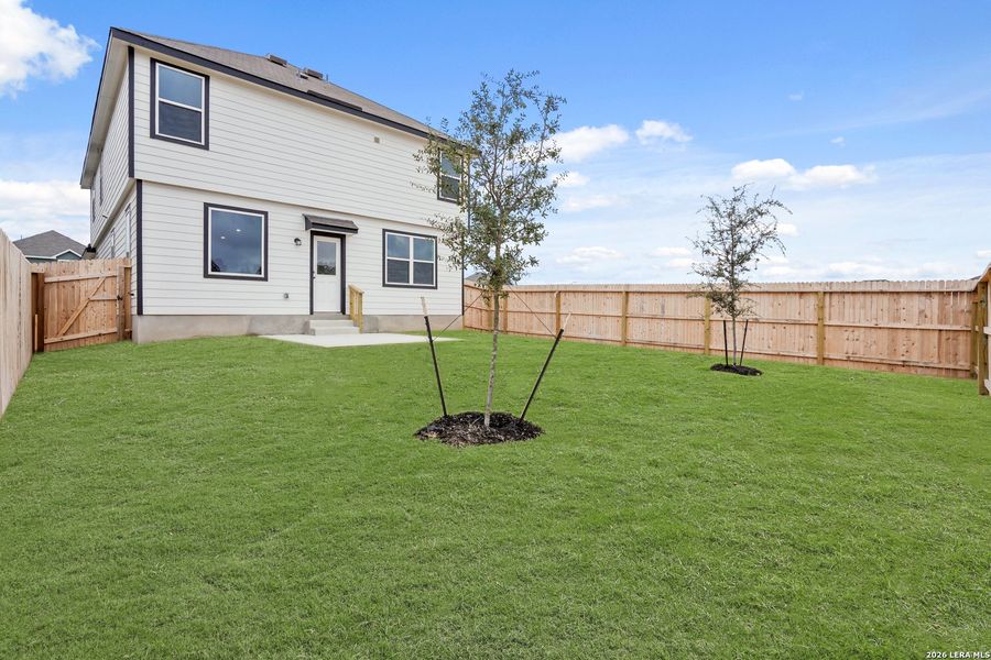 Exterior details and patio area of a home in Abbott Place, St. Hedwig (Image 4).