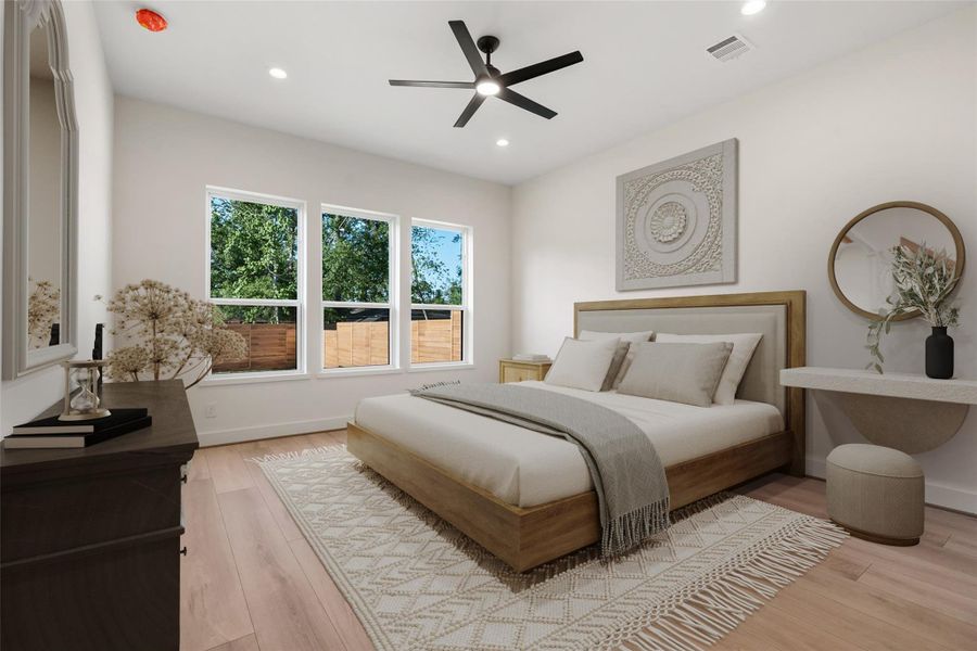This sun-filled primary bedroom offers calming views of the relaxing backyard and a spectacular spa-like ensuite bath. Virtually staged. This sun-filled primary bedroom offers calming views of the relaxing backyard and a spectacular spa-like ensuite bath. Virtually staged.