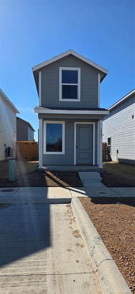 Front exterior of a new home in Tillage Farms, Princeton, TX, highlighting curb appeal (Image 2). Front exterior of a new home in Tillage Farms, Princeton, TX, highlighting curb appeal (Image 2).