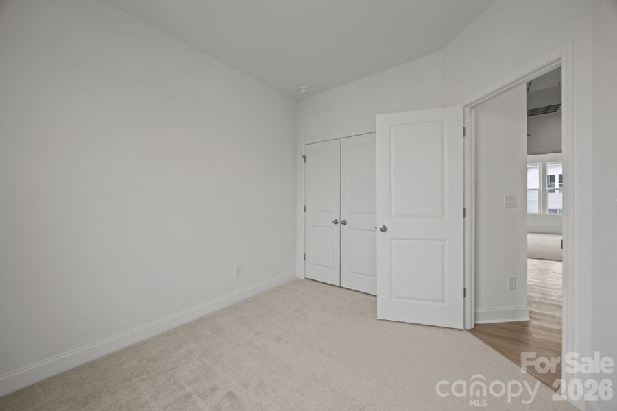 Spacious, unfurnished interior of a new home in The River District Townhomes, Charlotte (Image 27).