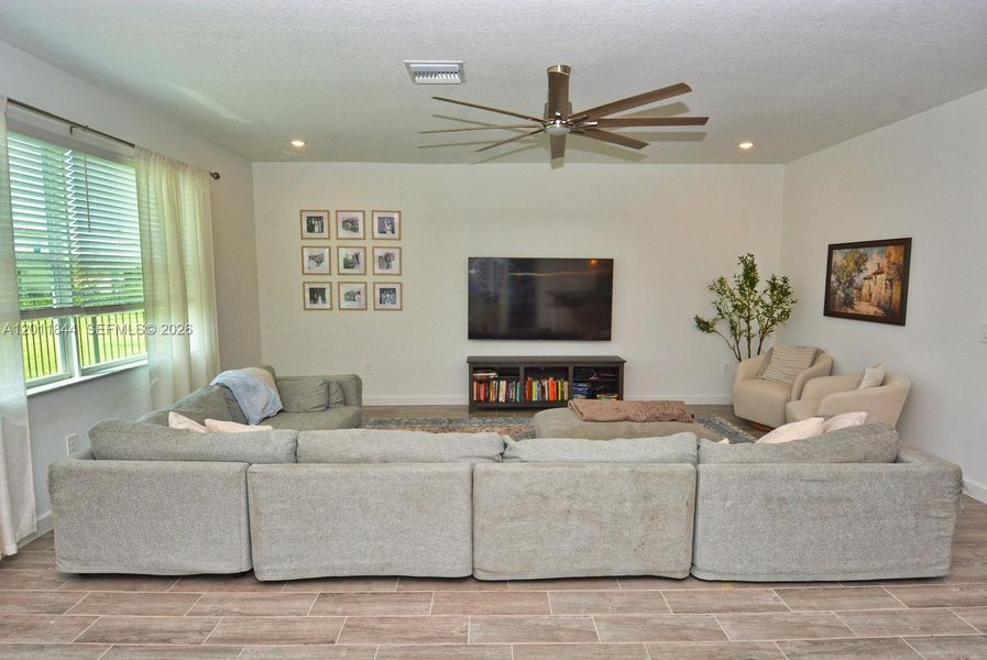 Furnished interior view inside a new home in Central Park, Port St. Lucie (Image 13).