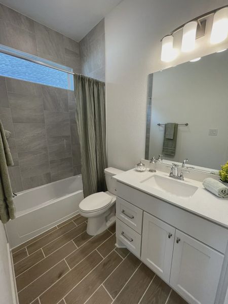 Representative furnished interior of a home built from the Mickelson by Chesmar Homes in Riceland Alley Loads, Mont Belvieu (Image 53).