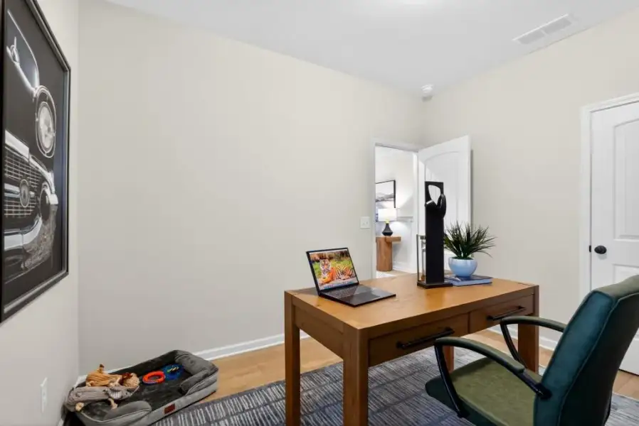 Furnished interior view inside a new home in Summerfield Place, Carrollton (Image 7). Furnished interior view inside a new home in Summerfield Place, Carrollton (Image 7).