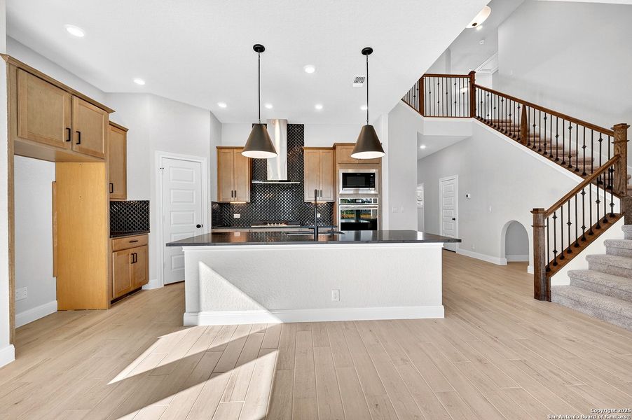 Furnished interior view inside a new home in Davis Ranch 60', San Antonio (Image 12).