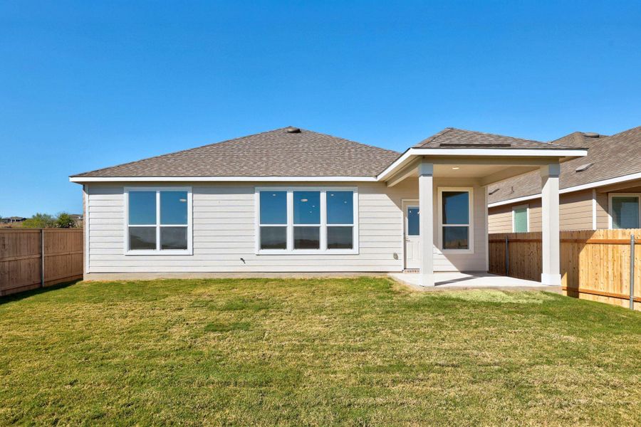 Exterior details and patio area of a home in McKinney Crossing, Austin (Image 19). Exterior details and patio area of a home in McKinney Crossing, Austin (Image 19).
