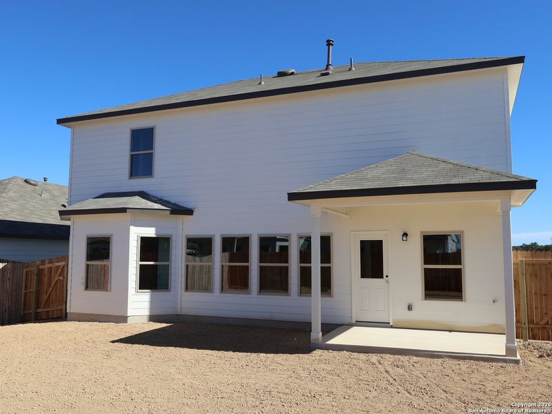 Exterior details and patio area of a home in Winding Brook, San Antonio (Image 20).