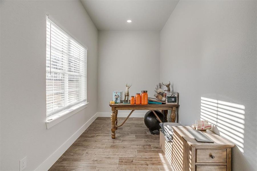 Home office featuring light wood-type flooring