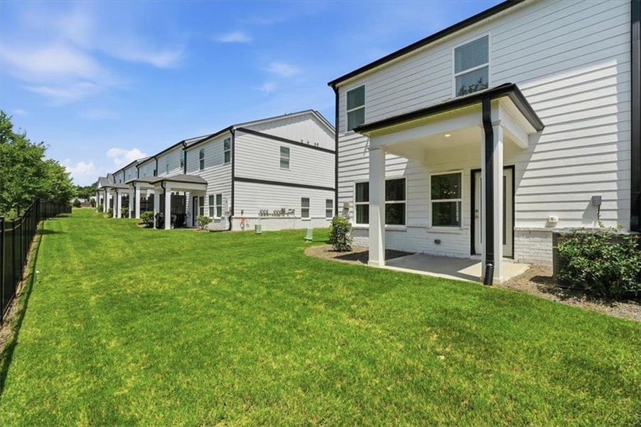 Exterior details and patio area of a home in Brooks at Riverview Landing, Smyrna (Image 3).