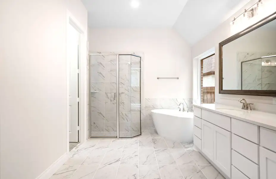 Representative furnished interior of a home built from the 3068 by Ravenna Homes in The Woodlands Hills 65′, Willis (Image 11).