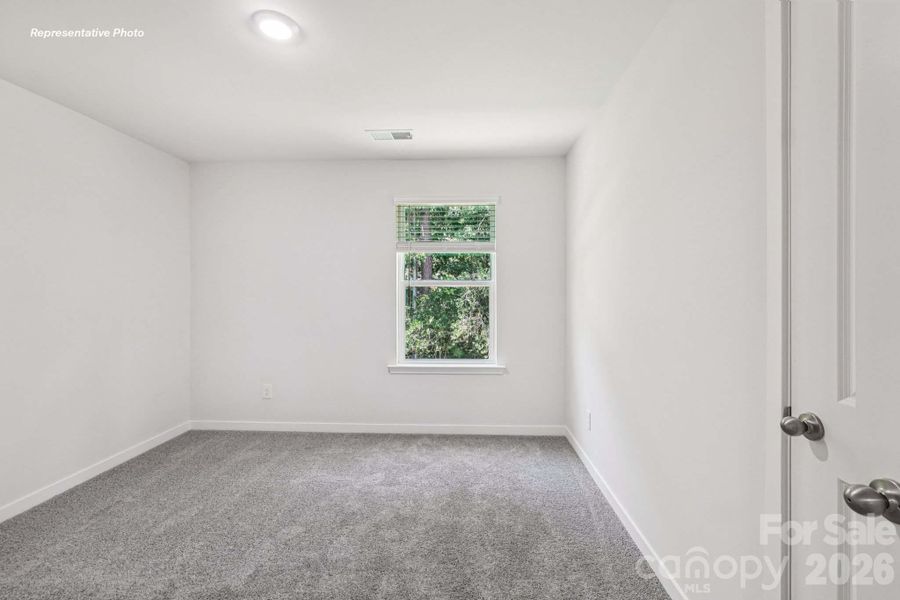 Spacious, unfurnished interior of a new home in Reedy Creek Preserve, Charlotte (Image 26).