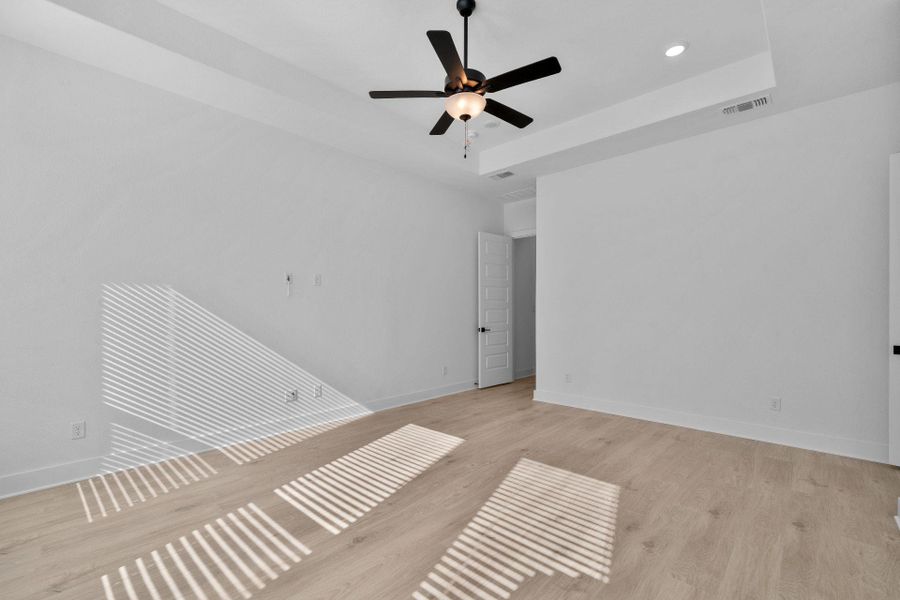 Primary Bedroom with tray ceiling