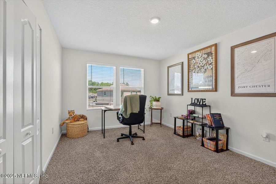 Furnished interior view inside a new home in River Glen Express, Yulee (Image 30).