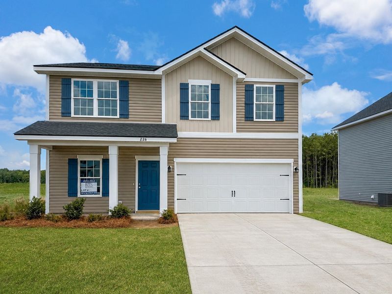 Front exterior of a new home in Tranquil South, Hinesville, GA, highlighting curb appeal (Image 1). Front exterior of a new home in Tranquil South, Hinesville, GA, highlighting curb appeal (Image 1).