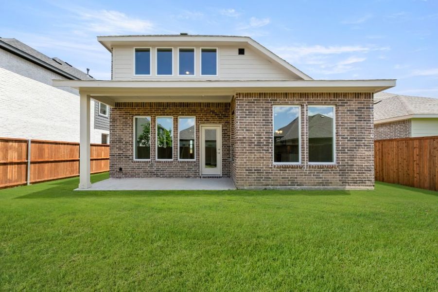 Exterior details and patio area of a home in Creekside, Royse City (Image 29).