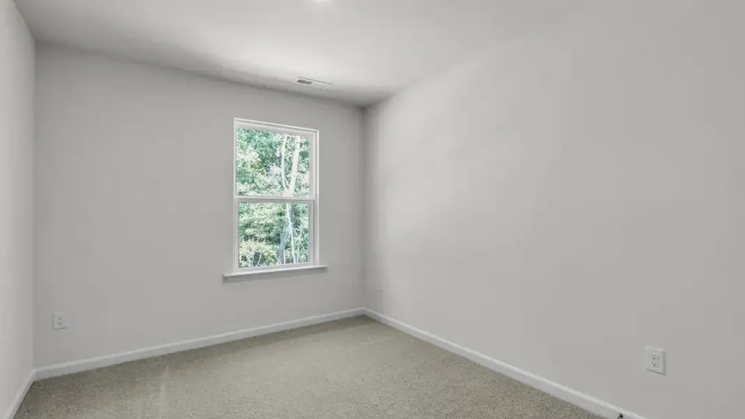 Spacious, unfurnished interior of a new home in The Townes at Prestleigh, Wake Forest (Image 18).